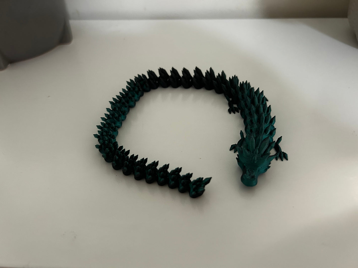 Small articulating dragon